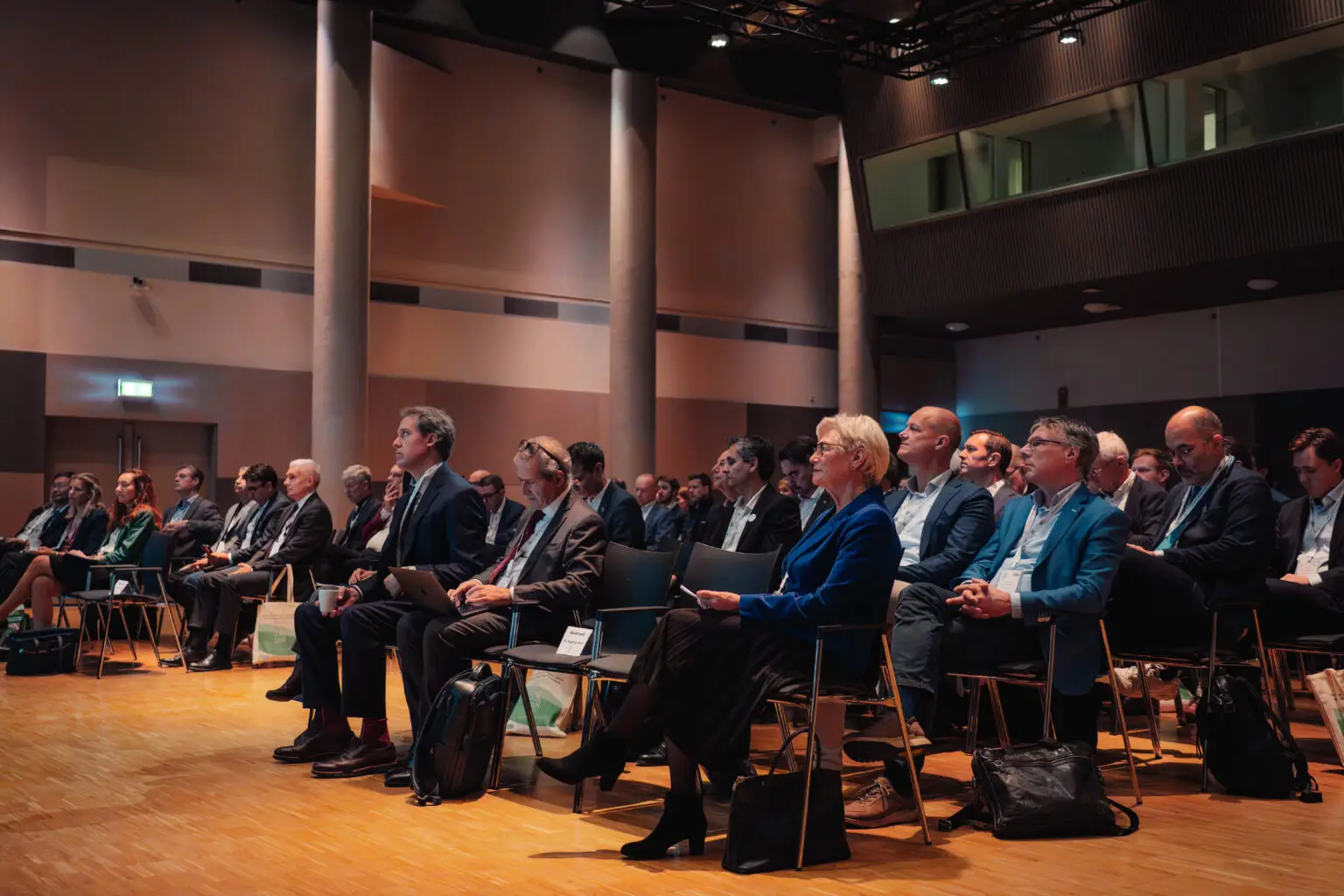 Delegates watching a session at the NexSMR conference