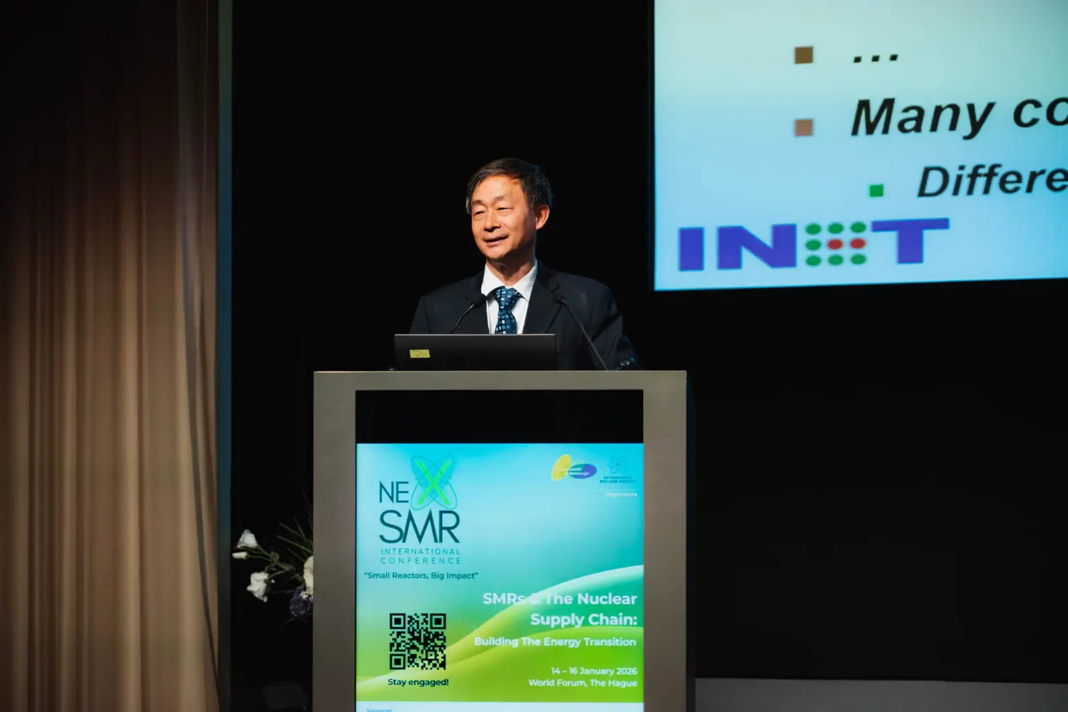 Speaker presenting at the NexSMR international conference