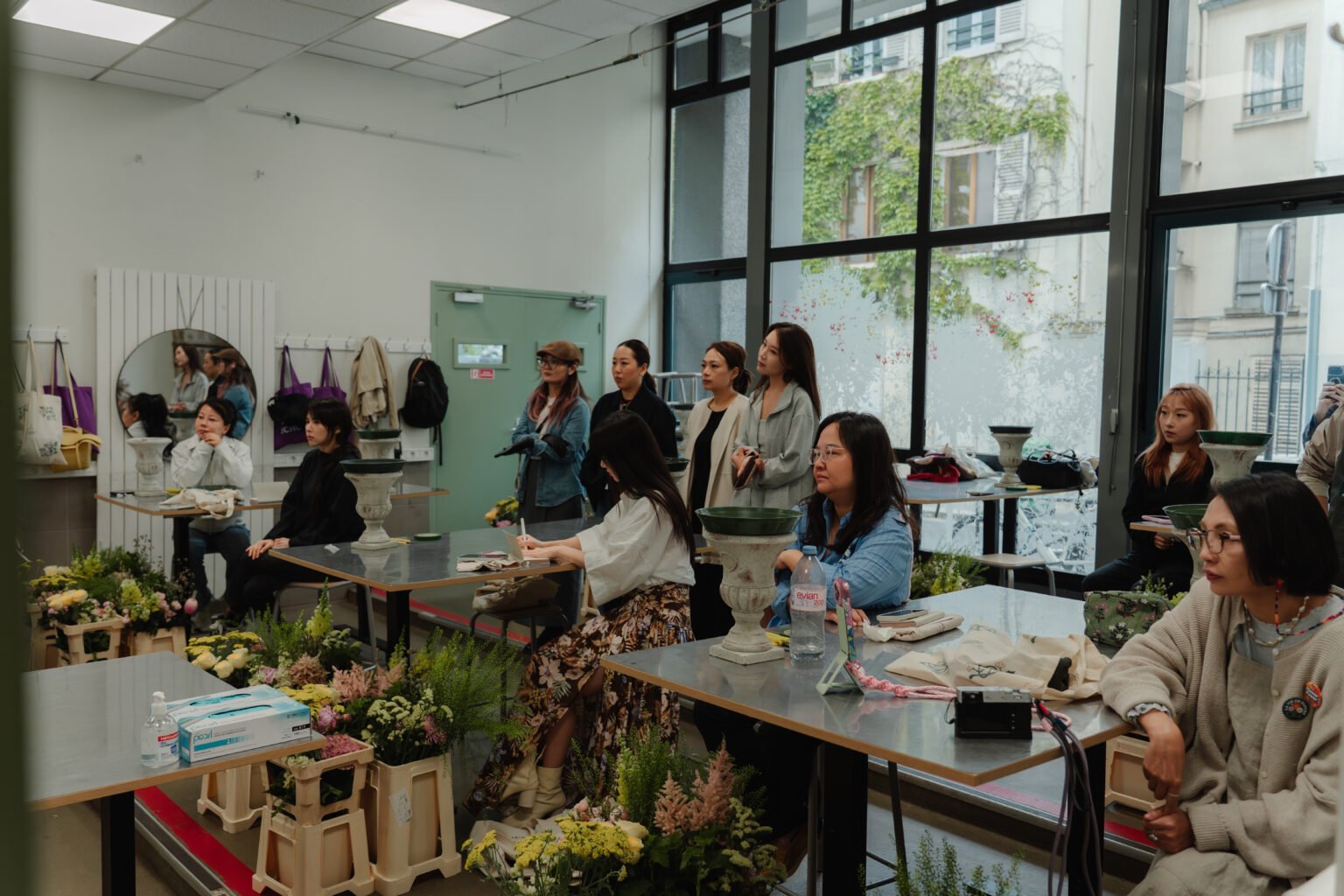 Students taking part in a hands-on floristry workshop
