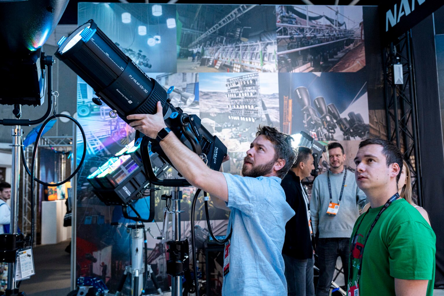 Visitor testing a NANLITE studio light at IBC