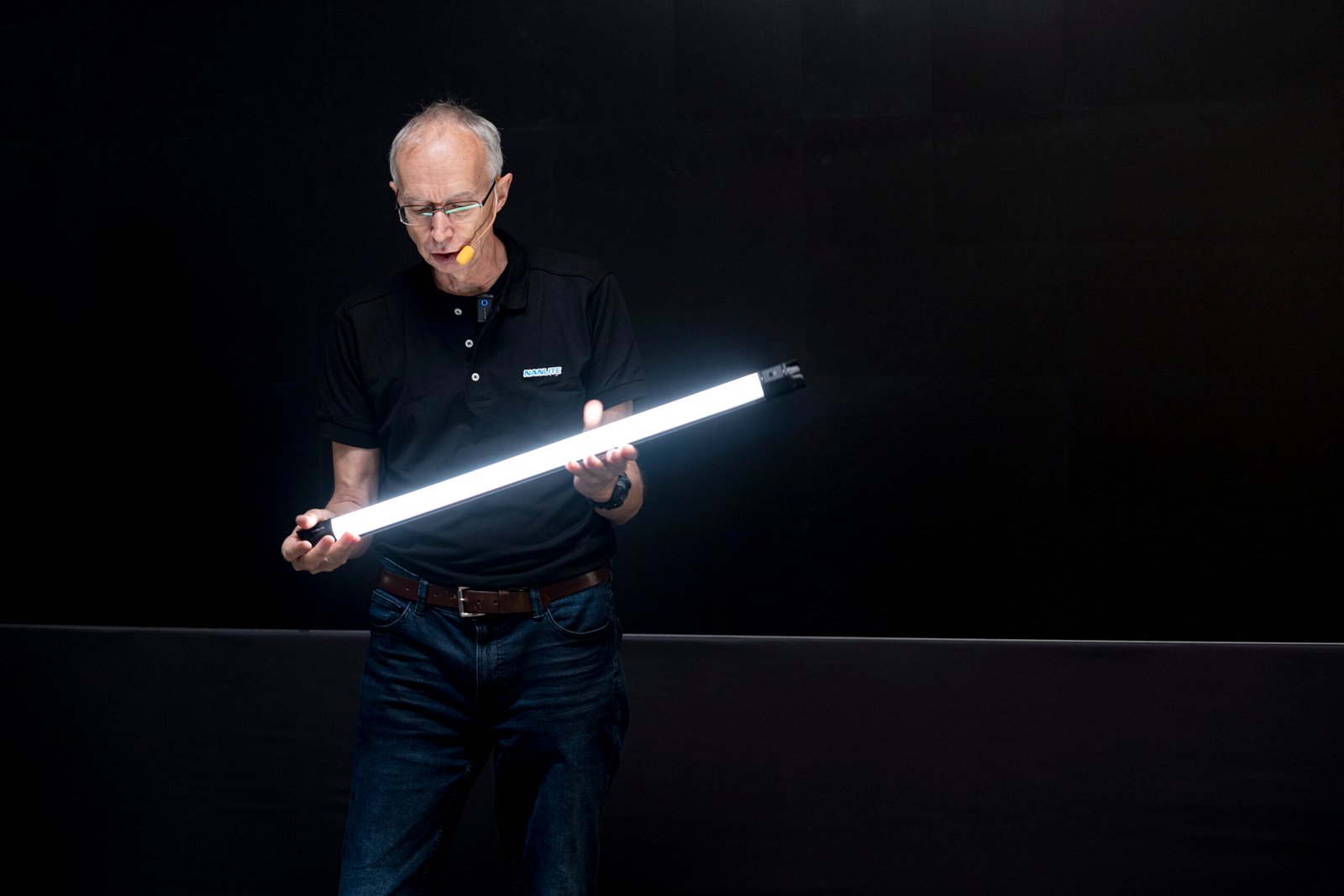 NANLITE tube light demonstrated against a dark backdrop