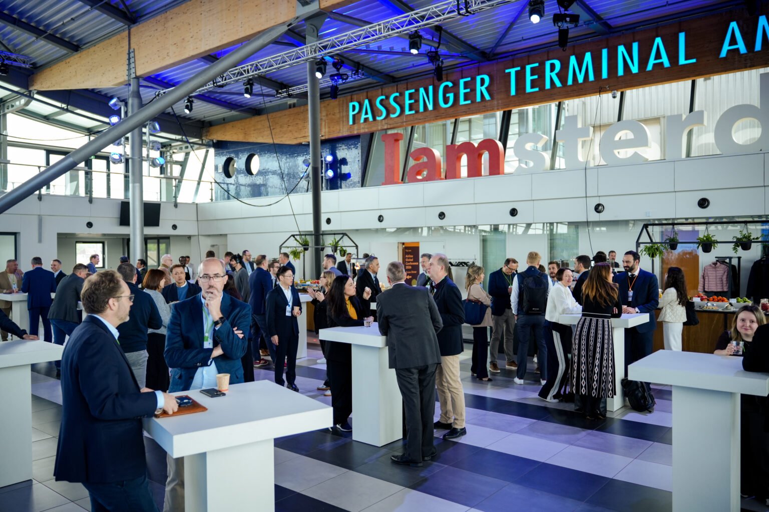 Delegates networking inside Amsterdam Passenger Terminal